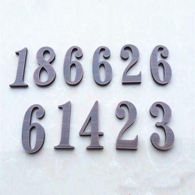 Stahlhaus-Weinlese-Metallbuchstaben und Zahl-Zeichen saures AntiuL